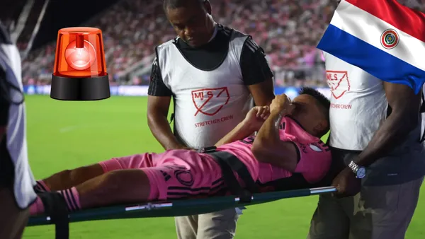 Diego Gómez retirado en ambulancia